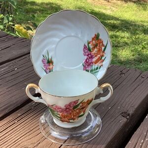 Vintage‎ August Gladiolus Cup and Saucer Set Gold Trim Floral Porcelain